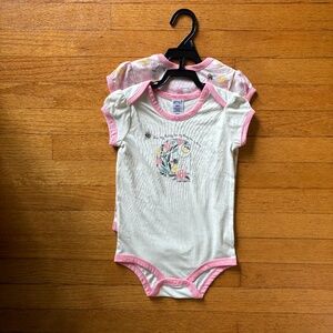 NWT Carhartt set of two body suits 24m